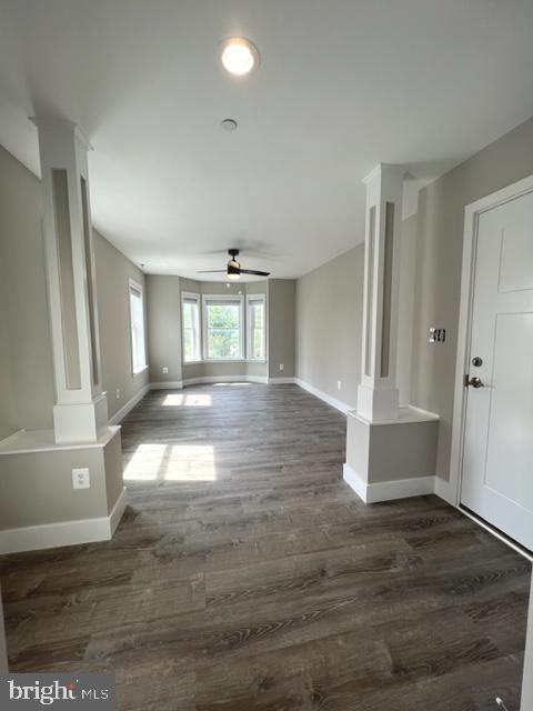 4114 3rd Street, Unit 2 North Beach, MD 20714 - Photo 7 of 24 an empty room with wooden floor and windows