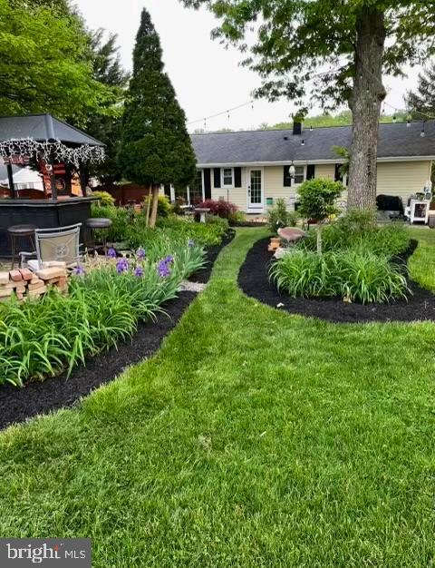 120 Kingbrook Road Linthicum Heights, MD 21090 - Photo 41 of 42 Rear Yard View (Everything in Full Bloom)