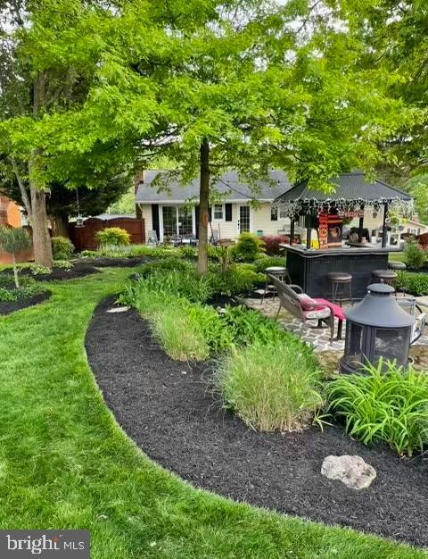 120 Kingbrook Road Linthicum Heights, MD 21090 - Photo 42 of 42 Rear Yard View (Everything in Full Bloom)