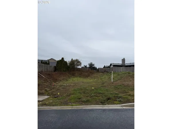 a view of water heater and hardwood floor