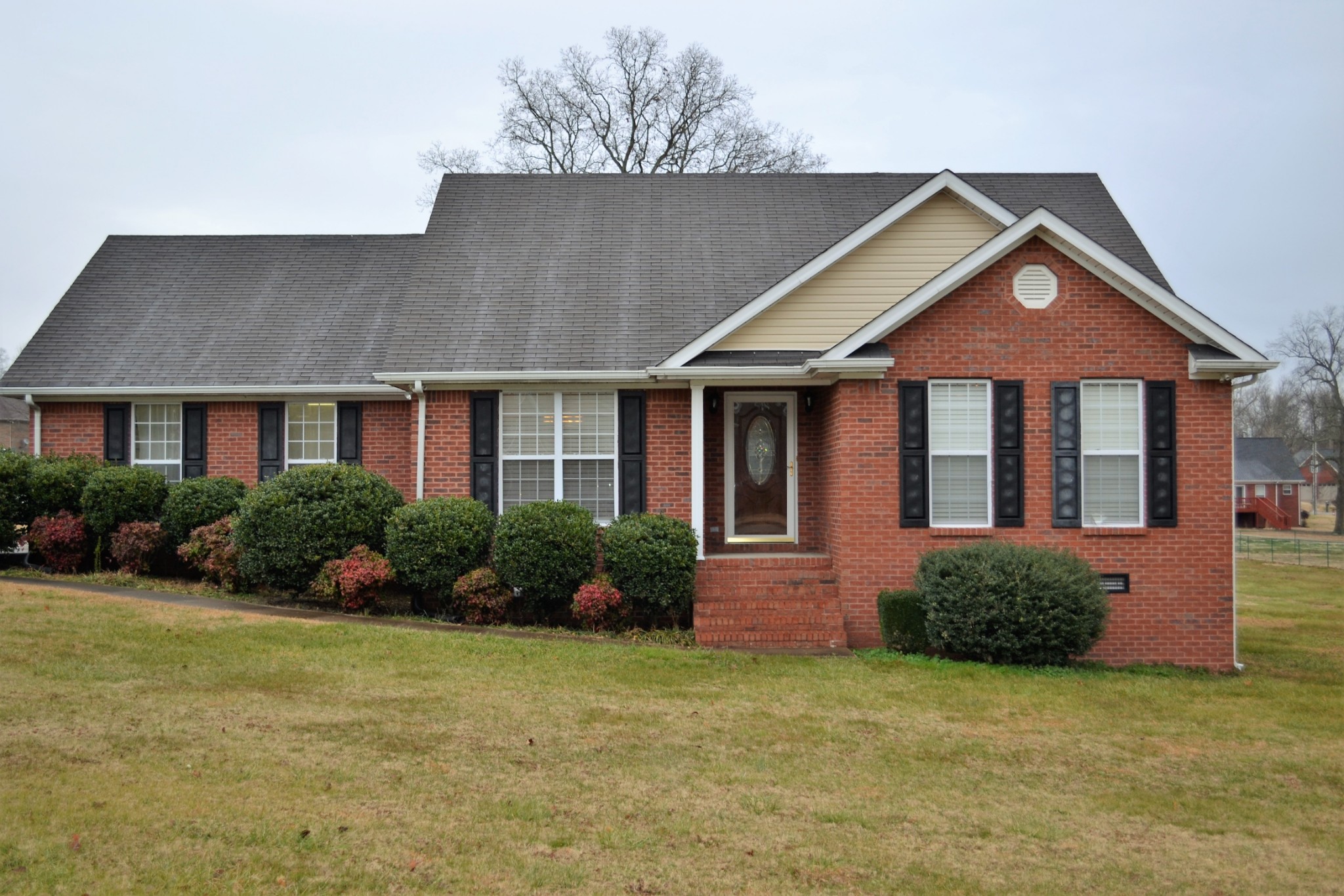 80 Eastridge Road Fayetteville, TN 37334 - Photo 1 of 43 a front view of a house with garden
