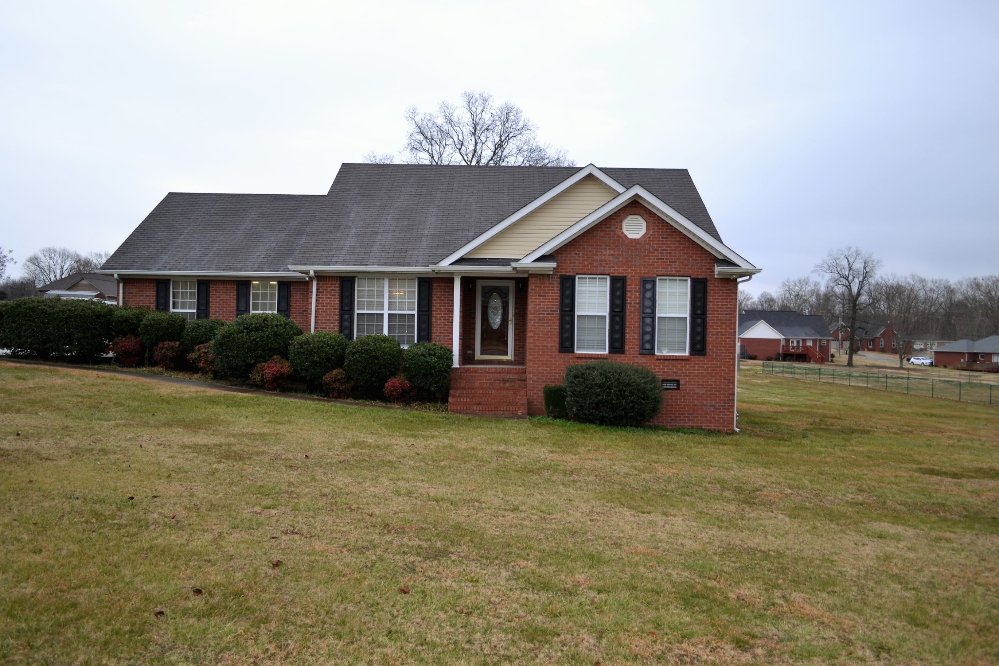 80 Eastridge Road Fayetteville, TN 37334 - Photo 2 of 43 a front view of a house with garden