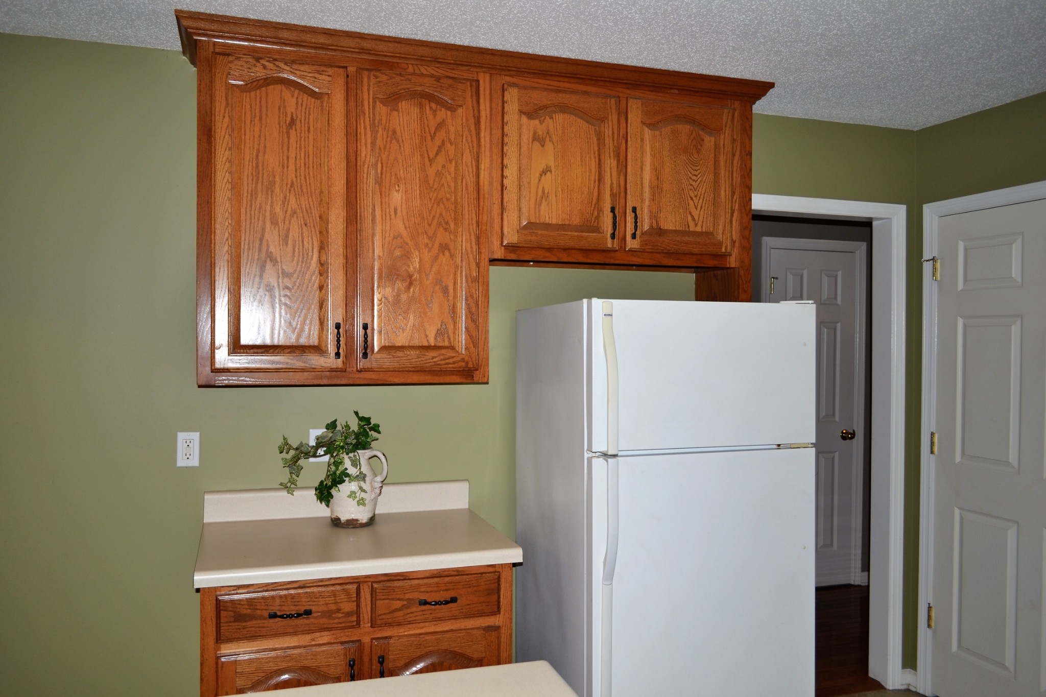 80 Eastridge Road Fayetteville, TN 37334 - Photo 11 of 43 a kitchen with stainless steel appliances granite countertop a refrigerator and a cabinets