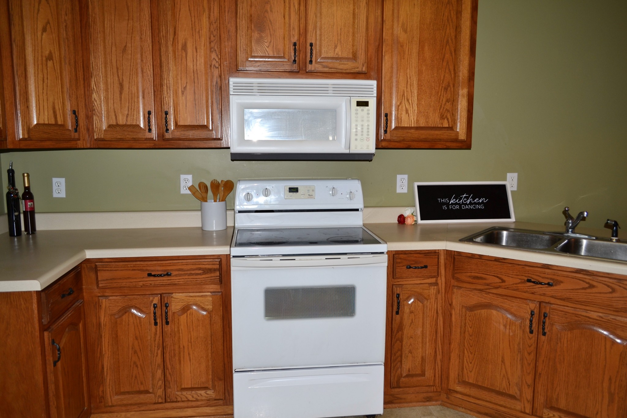 80 Eastridge Road Fayetteville, TN 37334 - Photo 13 of 43 a kitchen with stainless steel appliances granite countertop a sink stove and cabinets