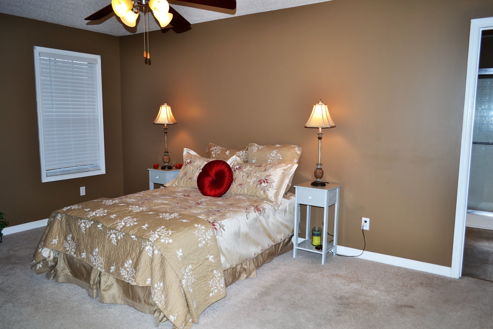 80 Eastridge Road Fayetteville, TN 37334 - Photo 22 of 43 a bedroom with a bed and a chandelier