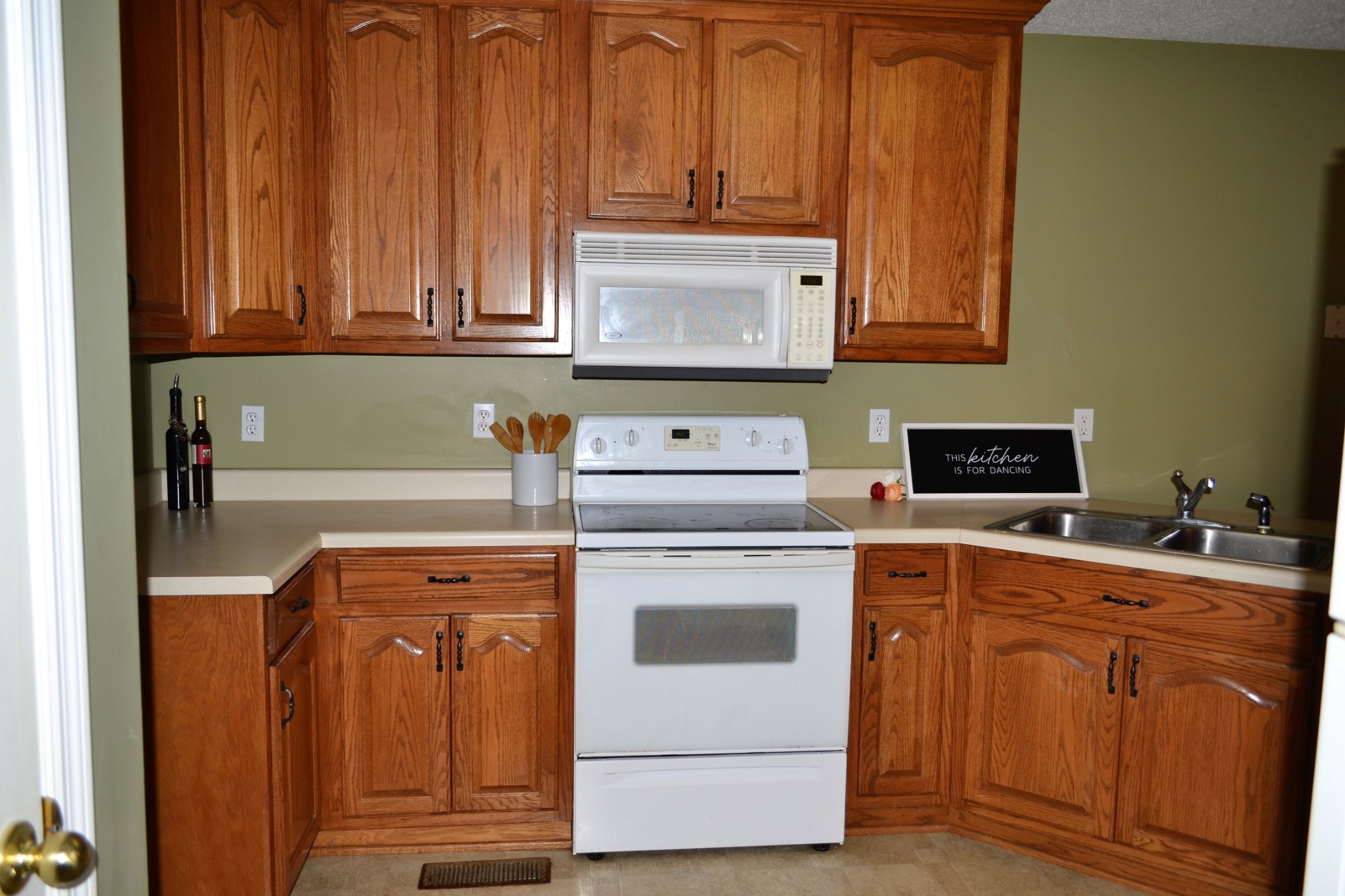 80 Eastridge Road Fayetteville, TN 37334 - Photo 7 of 43 a kitchen with stainless steel appliances granite countertop a stove a sink and a microwave