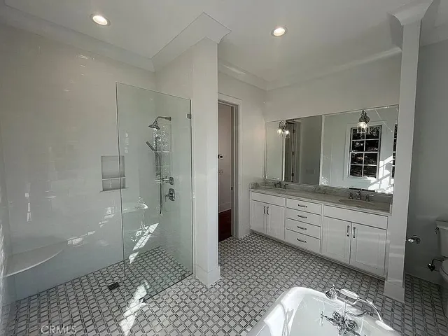 a bathroom with a sink and a vanity