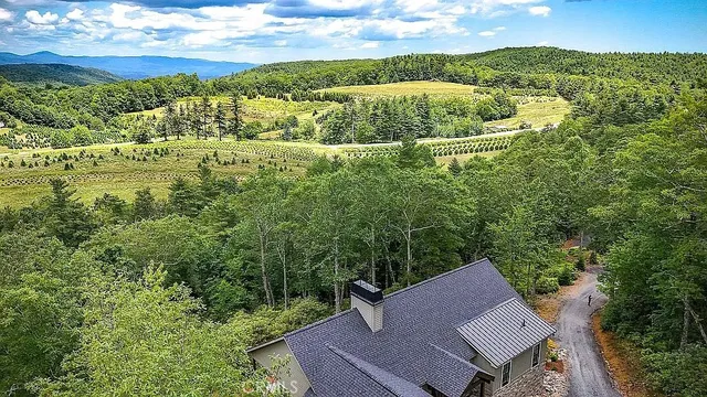 a view of a yard with an outdoor seating