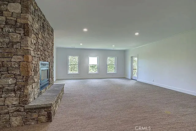 a view of a room with wooden walls