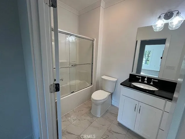 a view of a big yard with lots of green space and mountain view