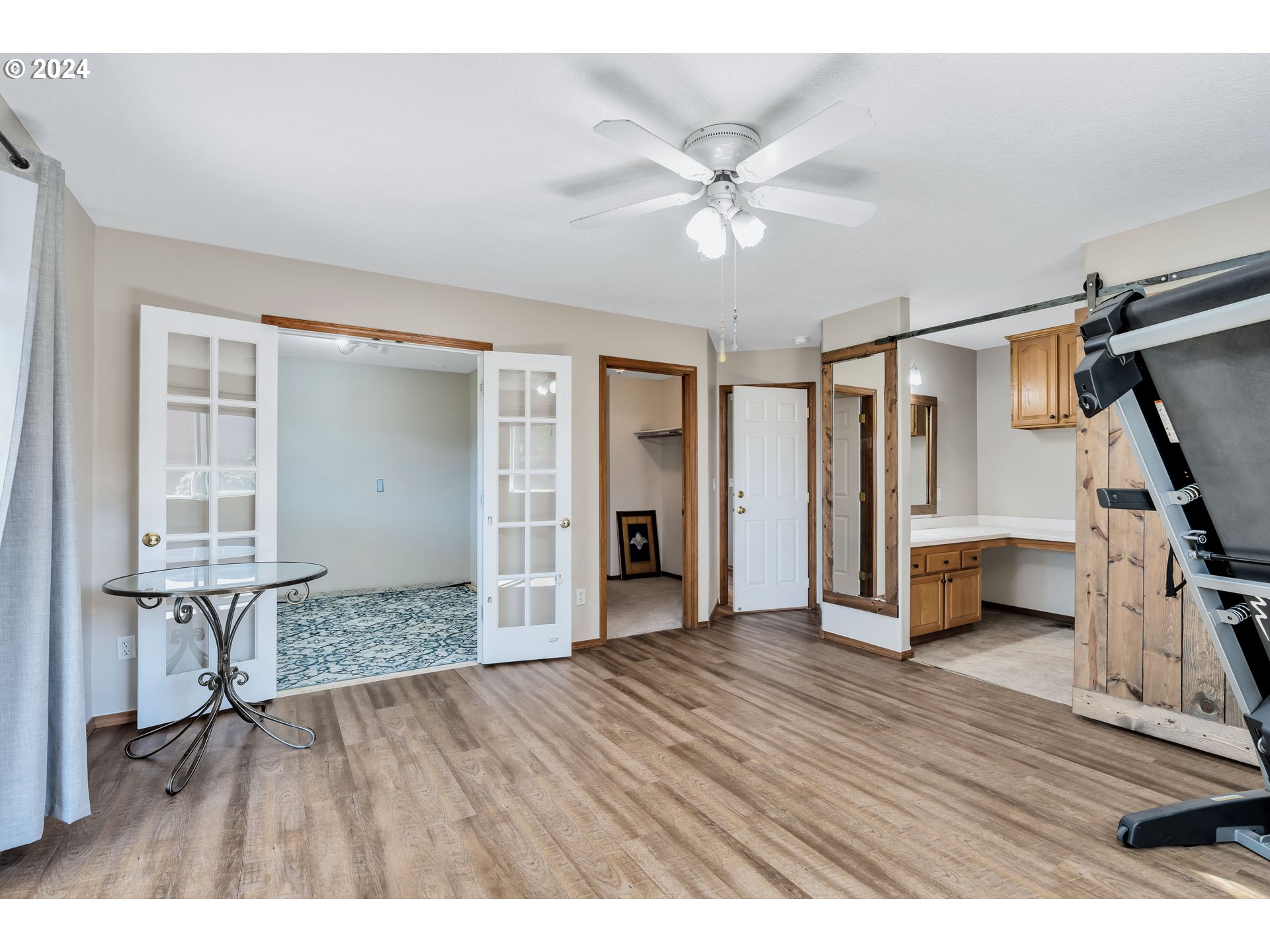 26400 Northeast 29th Avenue Ridgefield, WA 98642 - Photo 20 of 48 a view interior of a house with wooden floor stairs and a chandelier fan