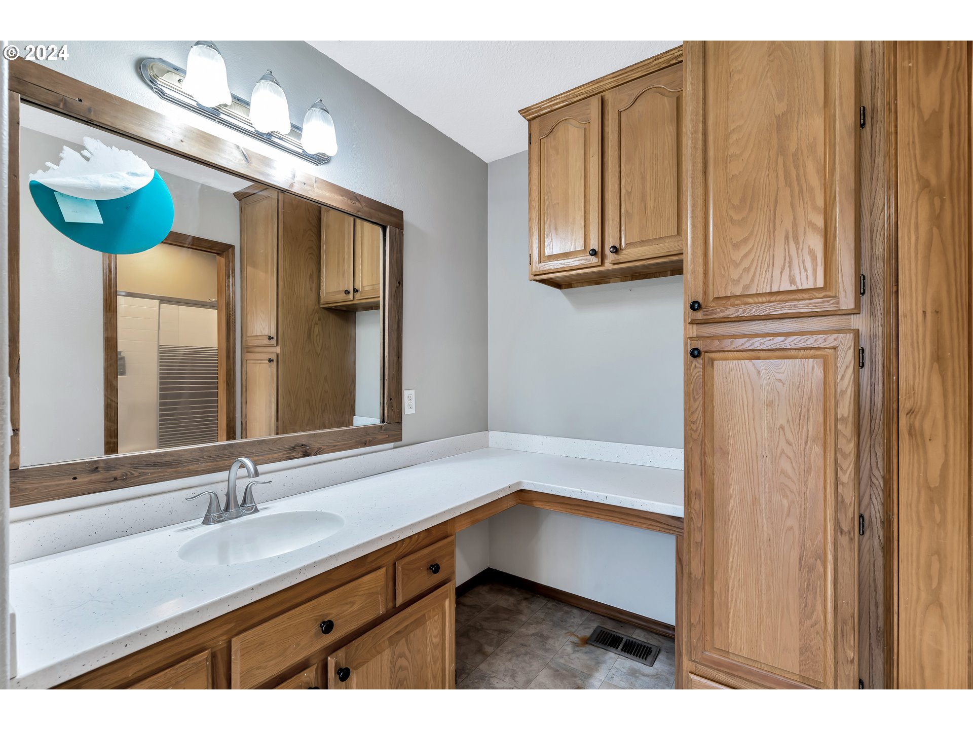 26400 Northeast 29th Avenue Ridgefield, WA 98642 - Photo 24 of 48 a bathroom with a sink and a mirror