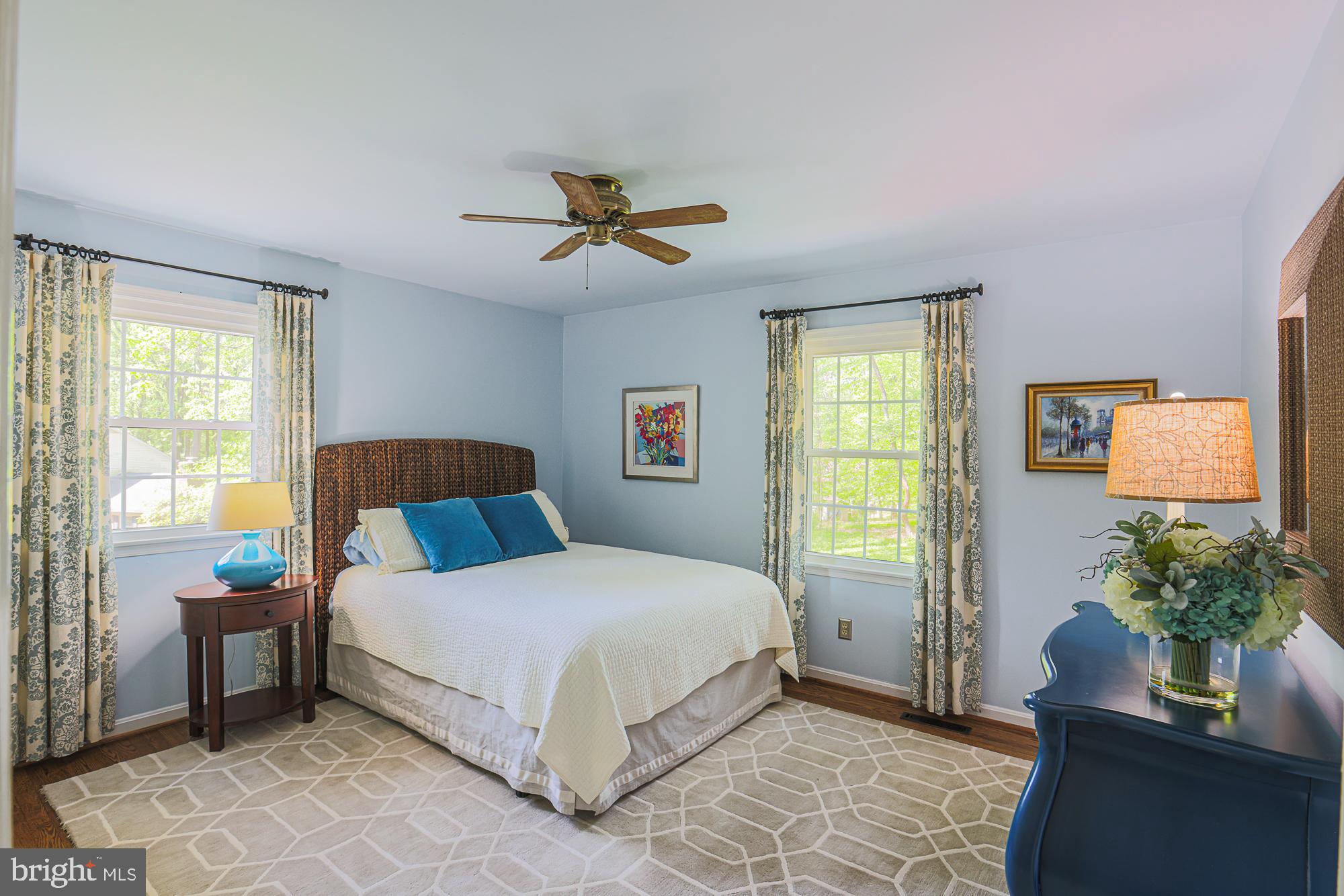1516 Pinnacle Road Baltimore, MD 21286 - Photo 35 of 53 a bedroom with a bed and a potted plant