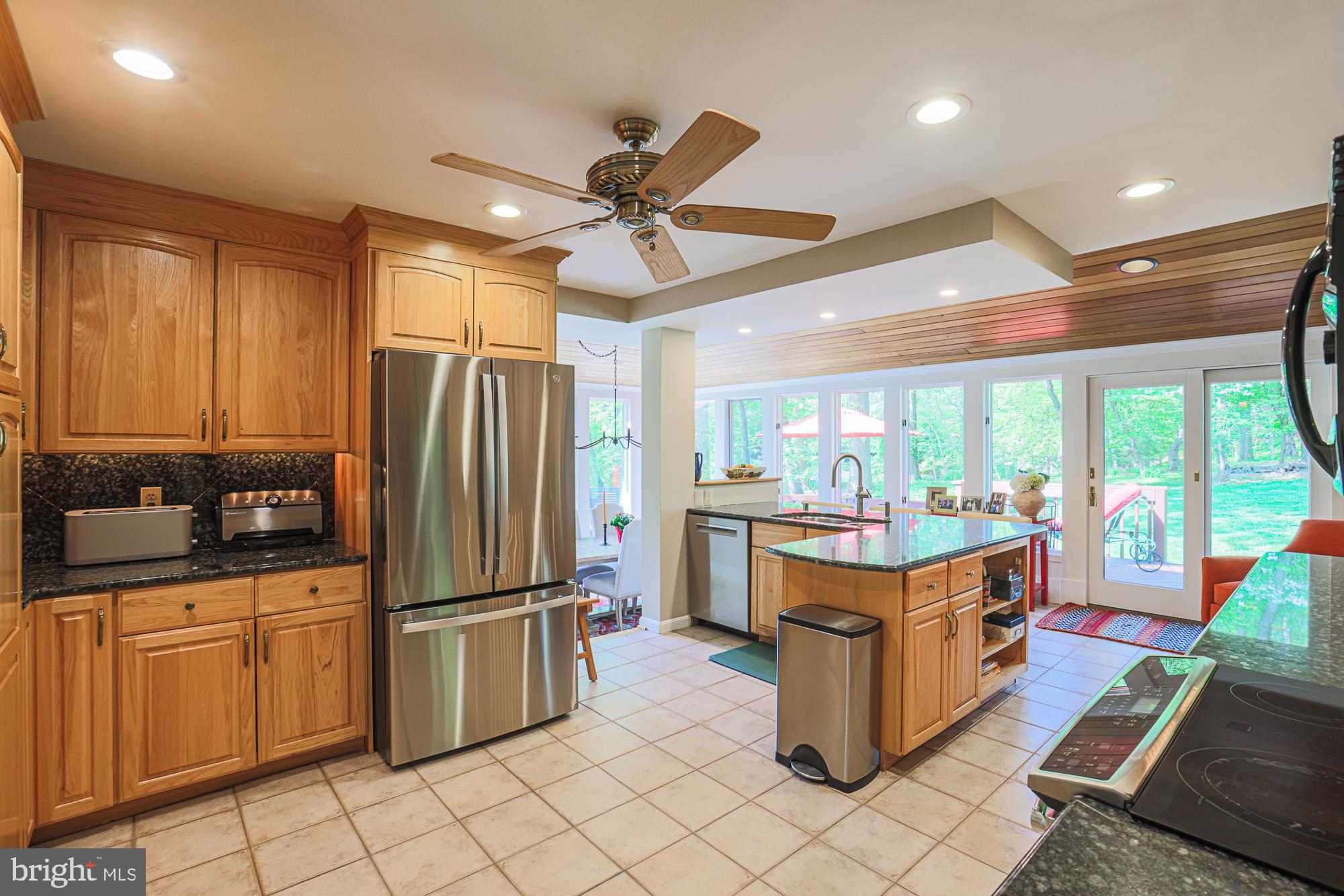 1516 Pinnacle Road Baltimore, MD 21286 - Photo 8 of 53 a kitchen with granite countertop a sink appliances and cabinets