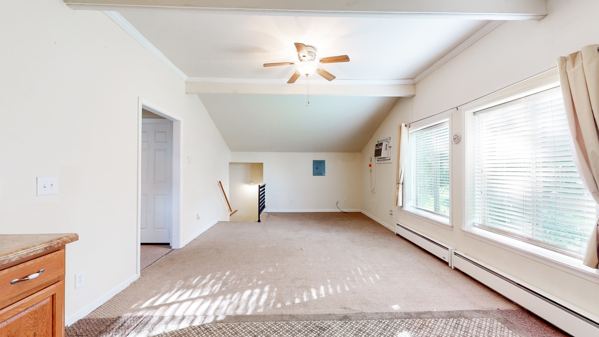 809 East 14th Street Georgetown, IL 61846 - Photo 35 of 52 a view of a livingroom with a ceiling fan and window