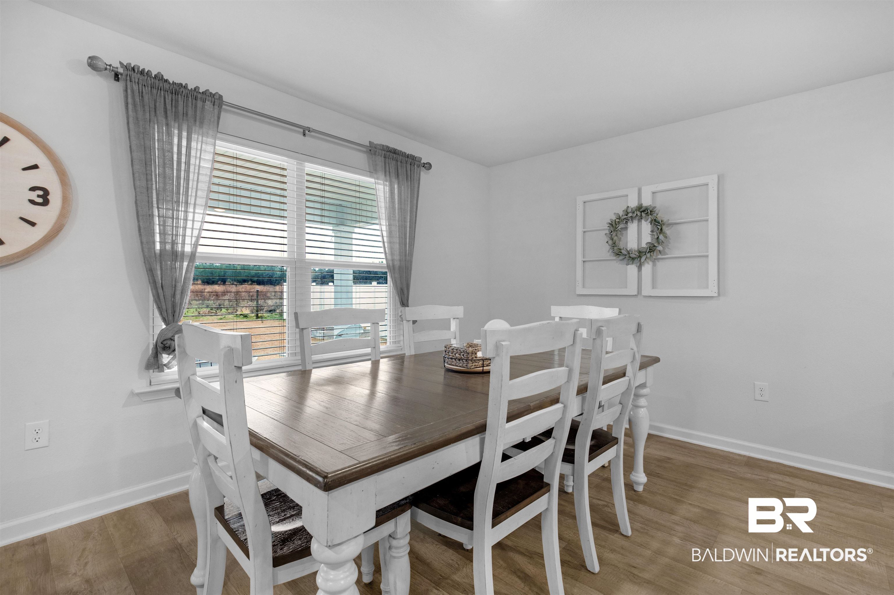 10313 Ruffian Route Daphne, AL 36526 - Photo 18 of 46 Dining room featuring hardwood / wood-style flooring