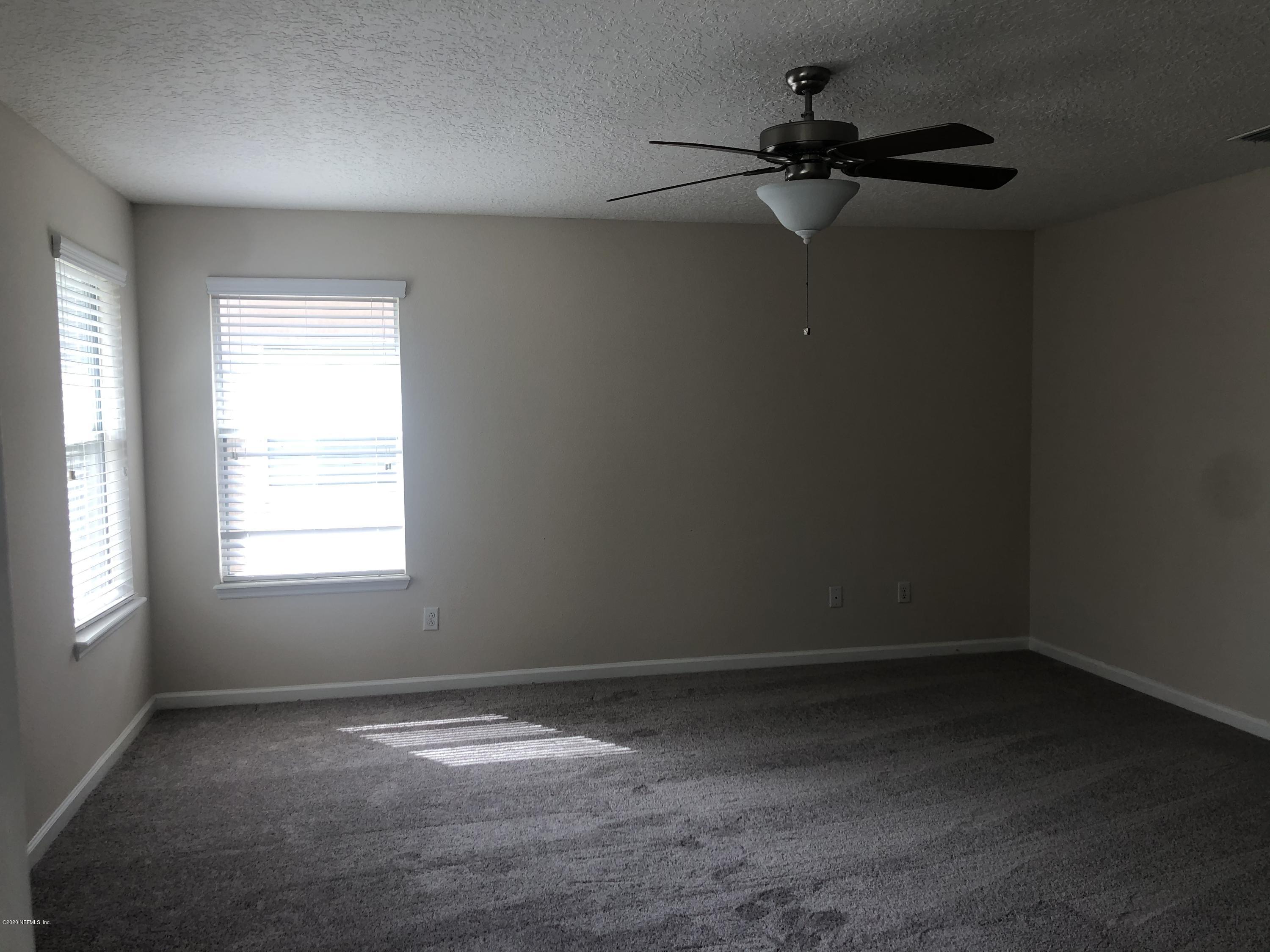 3782 Chasing Falls Road Orange Park, FL 32065 - Photo 12 of 22 an empty room with a window