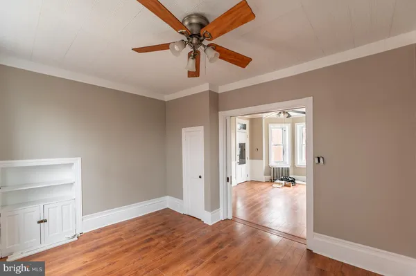 a view of a livingroom with wooden floor