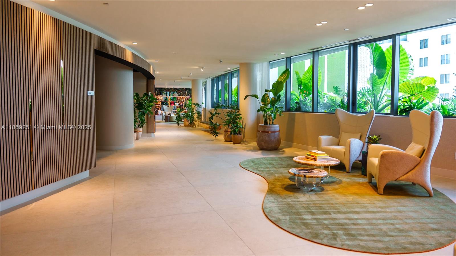 700 Northeast 24th Street, Unit 4101 Miami, FL 33137 - Photo 18 of 68 a view of a livingroom with furniture and floor to ceiling window