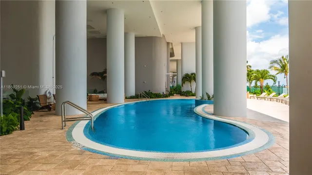 a view of a swimming pool with an outdoor space