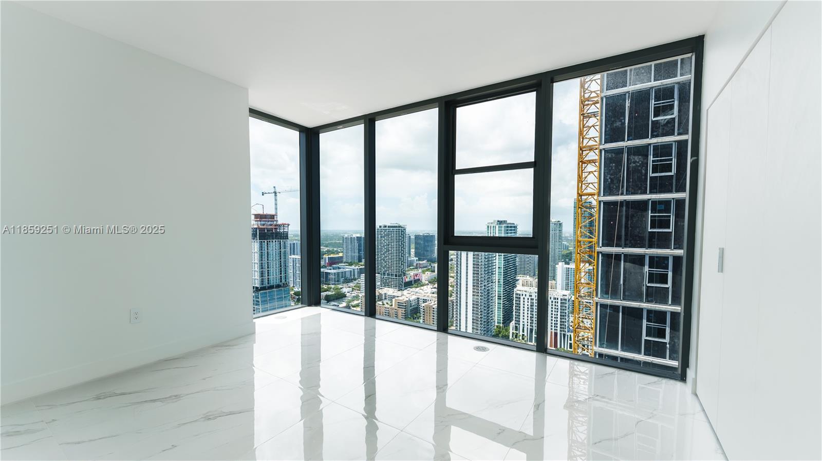 700 Northeast 24th Street, Unit 4101 Miami, FL 33137 - Photo 47 of 68 a view of a large window with a balcony