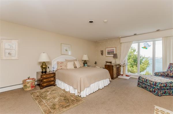 32 Crestwood Road Marblehead, MA 01945 - Photo 15 of 30 a bedroom with a bed and a couch