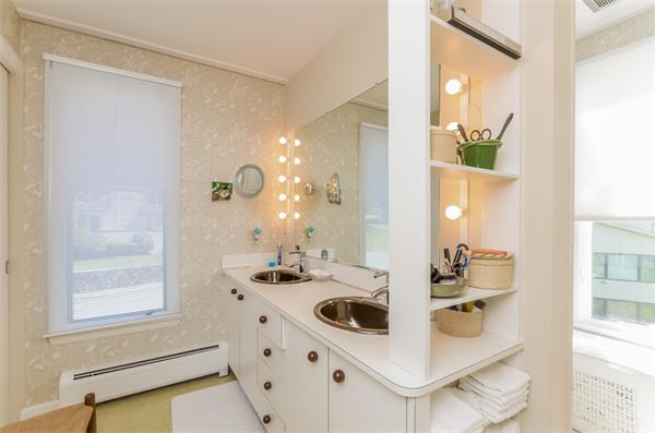 32 Crestwood Road Marblehead, MA 01945 - Photo 16 of 30 a bathroom with a sink double vanity and a mirror