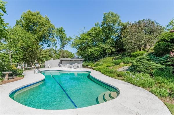 32 Crestwood Road Marblehead, MA 01945 - Photo 25 of 30 a view of a swimming pool in a backyard