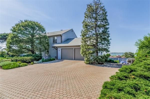 32 Crestwood Road Marblehead, MA 01945 - Photo 4 of 30 a front view of a house with a garden