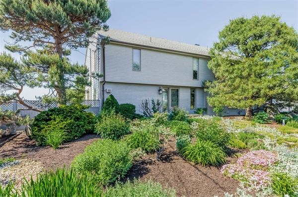 32 Crestwood Road Marblehead, MA 01945 - Photo 5 of 30 a view of a house with a yard and potted plants