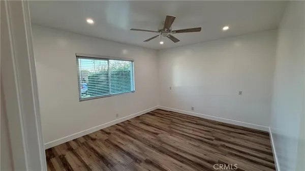 a view of a hallway view with staircase