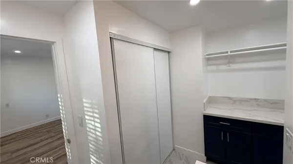 a utility room with a sink washer and dryer