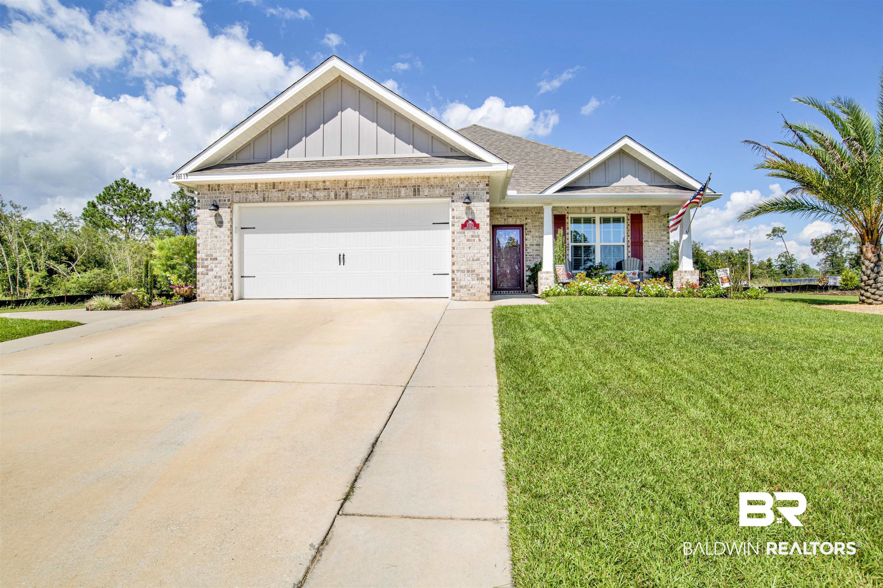 10113 Lakeview Drive Foley, AL 36535 - Photo 1 of 34 Craftsman inspired home with a garage and a front lawn