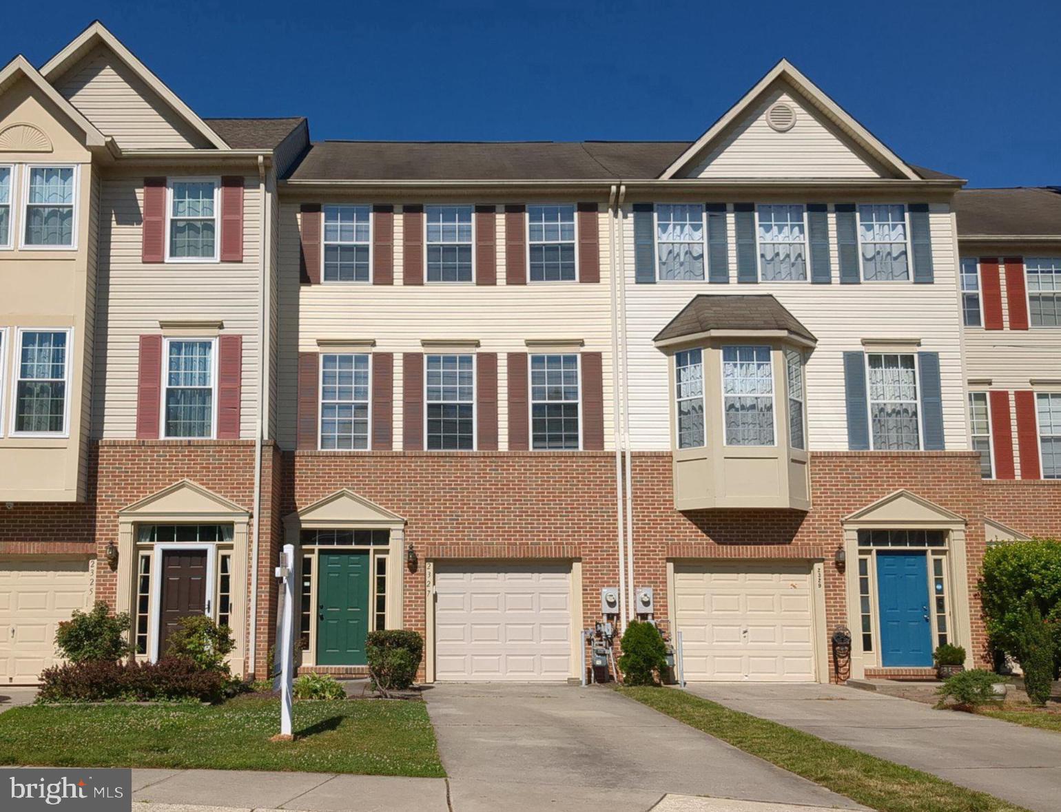 2327 Sandy Walk Way Odenton, MD 21113 - Photo 1 of 1 Charming townhomes with vibrant facades.