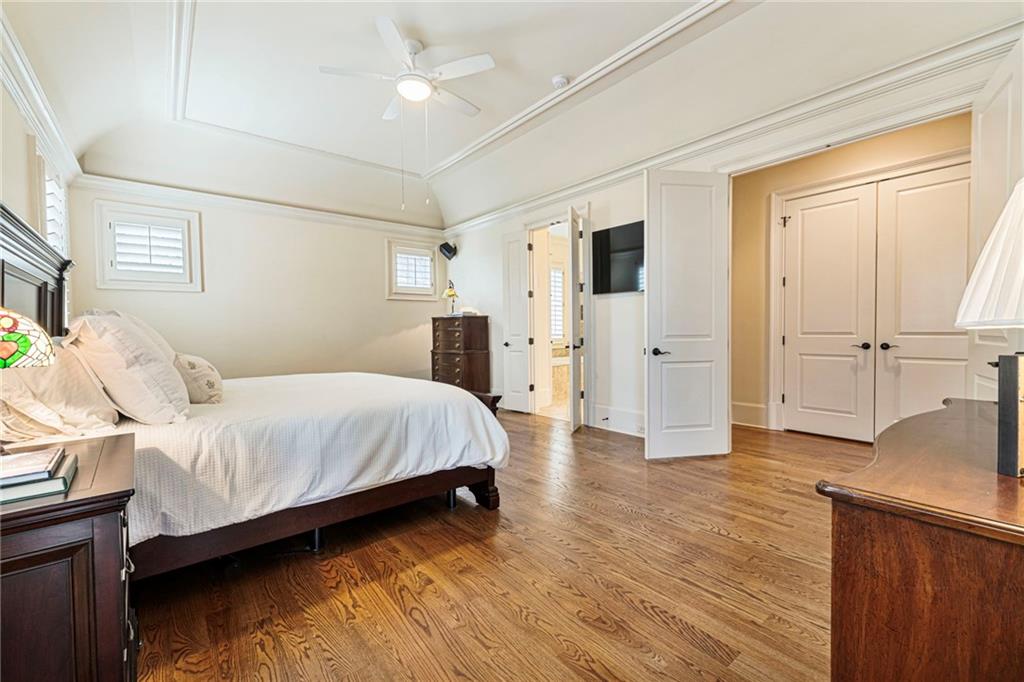 3751 Paces Lookout Circle Southeast Atlanta, GA 30339 - Photo 14 of 39 a spacious bedroom with a bed and a table