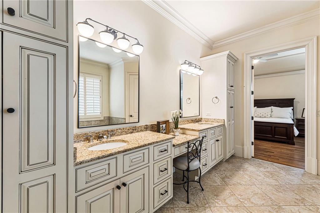 3751 Paces Lookout Circle Southeast Atlanta, GA 30339 - Photo 17 of 39 a spacious bathroom with a granite countertop double vanity sink a mirror and a