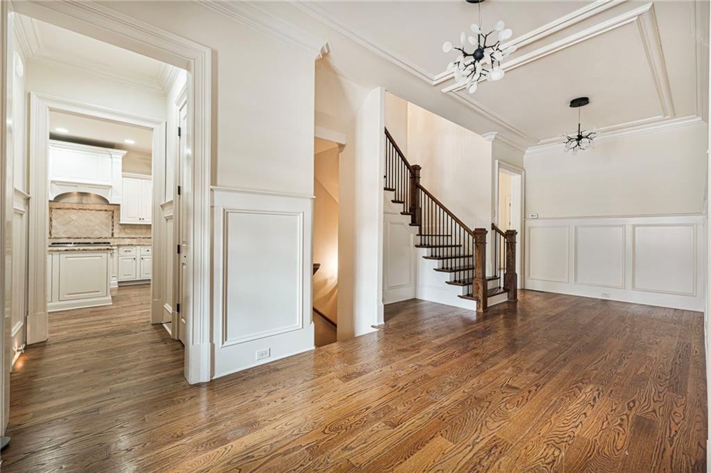3751 Paces Lookout Circle Southeast Atlanta, GA 30339 - Photo 19 of 39 a view of a hallway with wooden floor and staircase