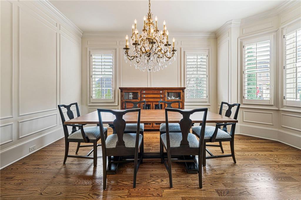 3751 Paces Lookout Circle Southeast Atlanta, GA 30339 - Photo 20 of 39 a view of a dining room with furniture window and wooden floor