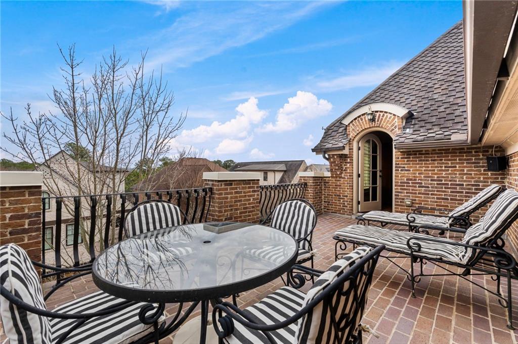3751 Paces Lookout Circle Southeast Atlanta, GA 30339 - Photo 26 of 39 a view of a chairs and table in the balcony