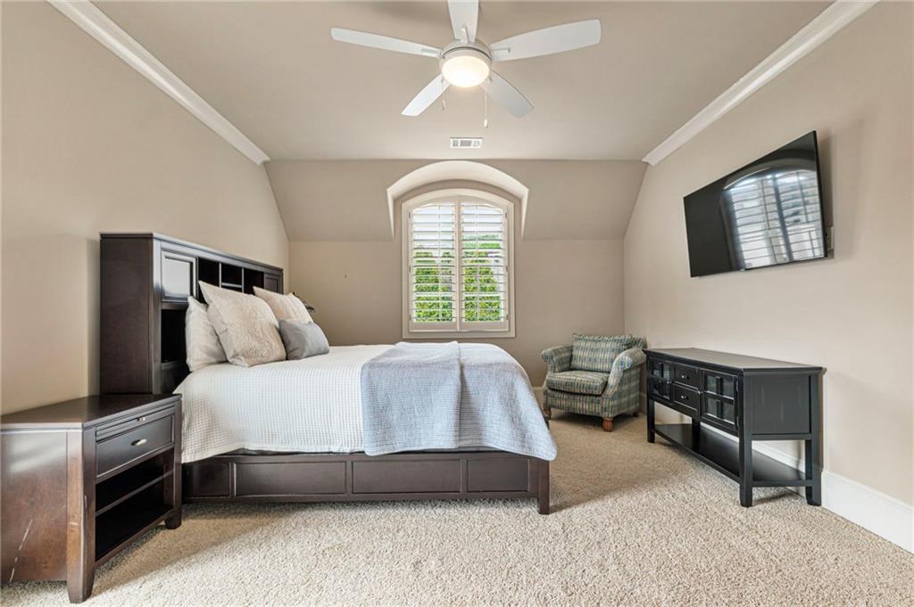 3751 Paces Lookout Circle Southeast Atlanta, GA 30339 - Photo 29 of 39 a bedroom with a bed and a couch