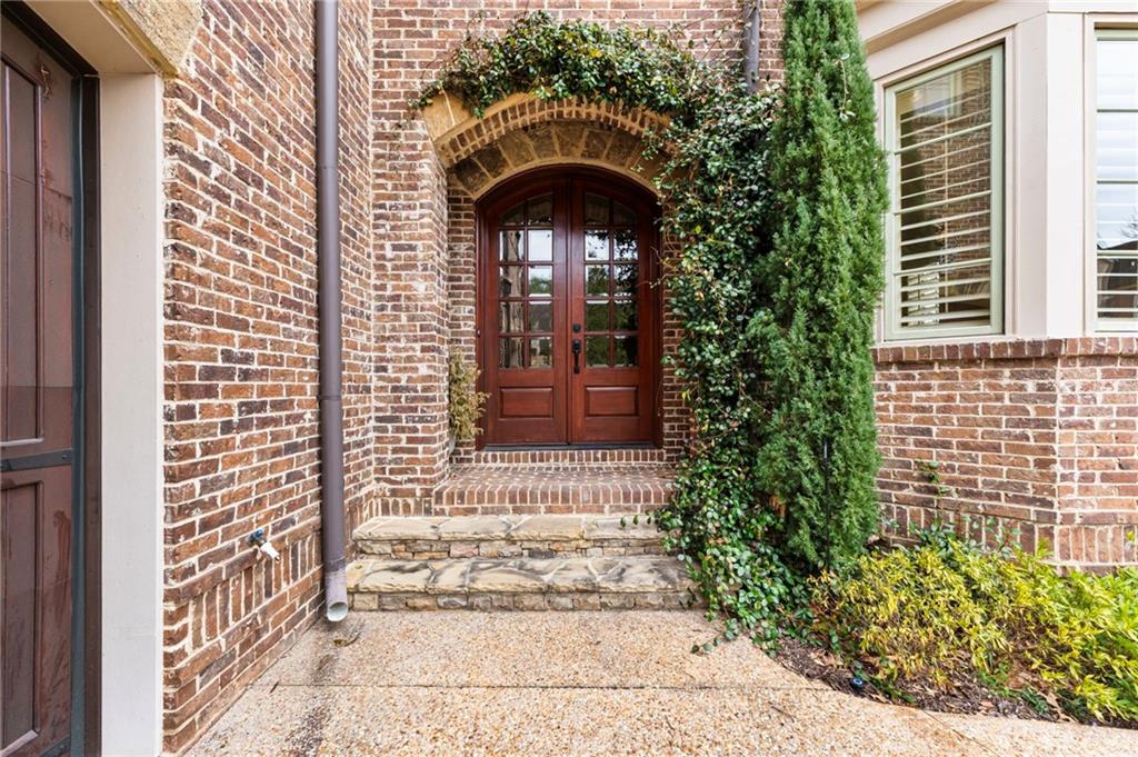 3751 Paces Lookout Circle Southeast Atlanta, GA 30339 - Photo 3 of 39 a front view of a house with a garden