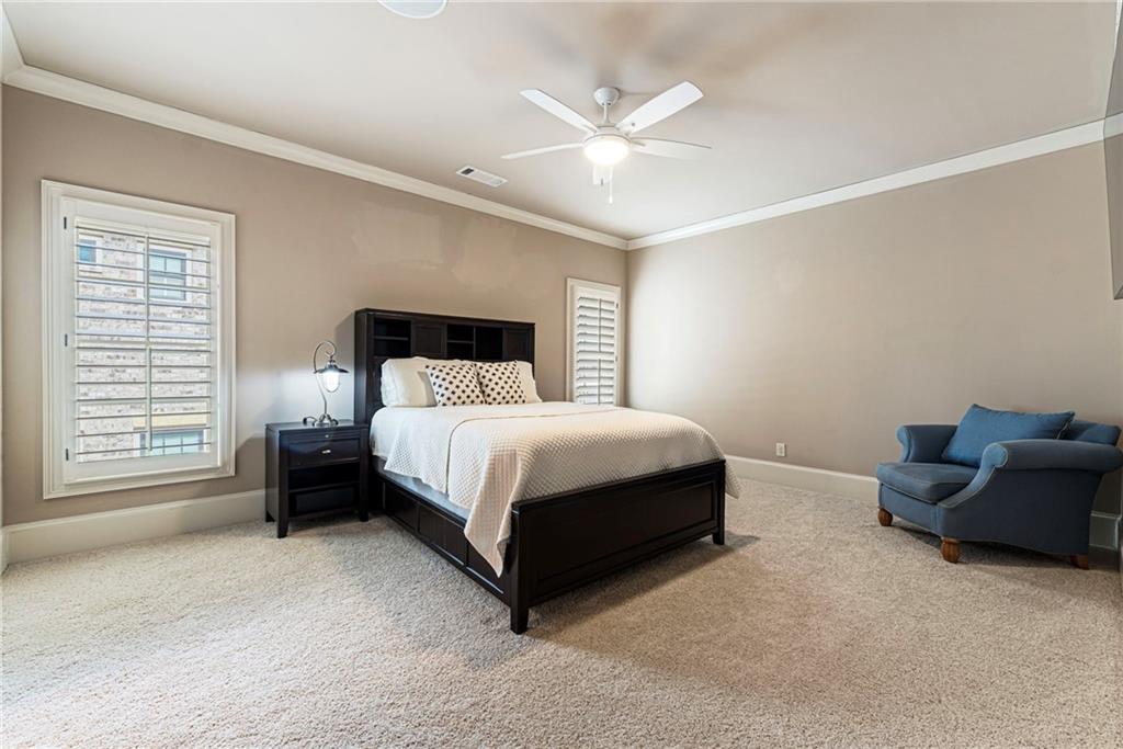 3751 Paces Lookout Circle Southeast Atlanta, GA 30339 - Photo 35 of 39 a bedroom with a bed and a couch