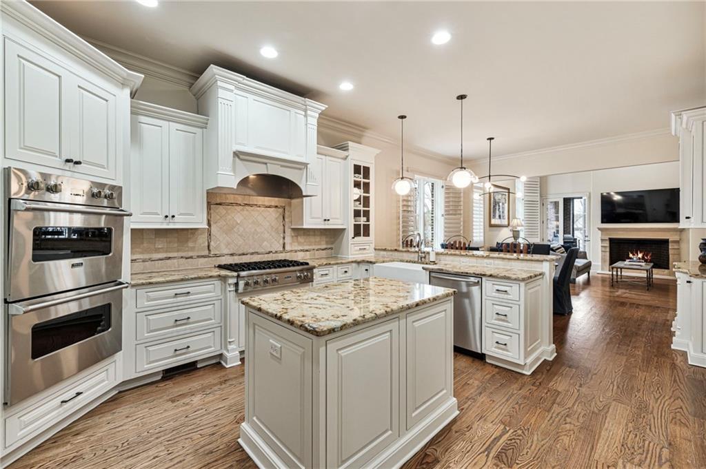 3751 Paces Lookout Circle Southeast Atlanta, GA 30339 - Photo 6 of 39 a kitchen with a sink stove and cabinets