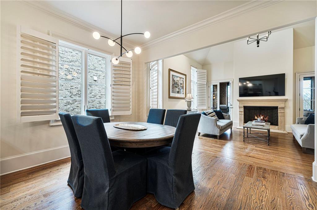 3751 Paces Lookout Circle Southeast Atlanta, GA 30339 - Photo 7 of 39 a view of a dining room with furniture window and wooden floor