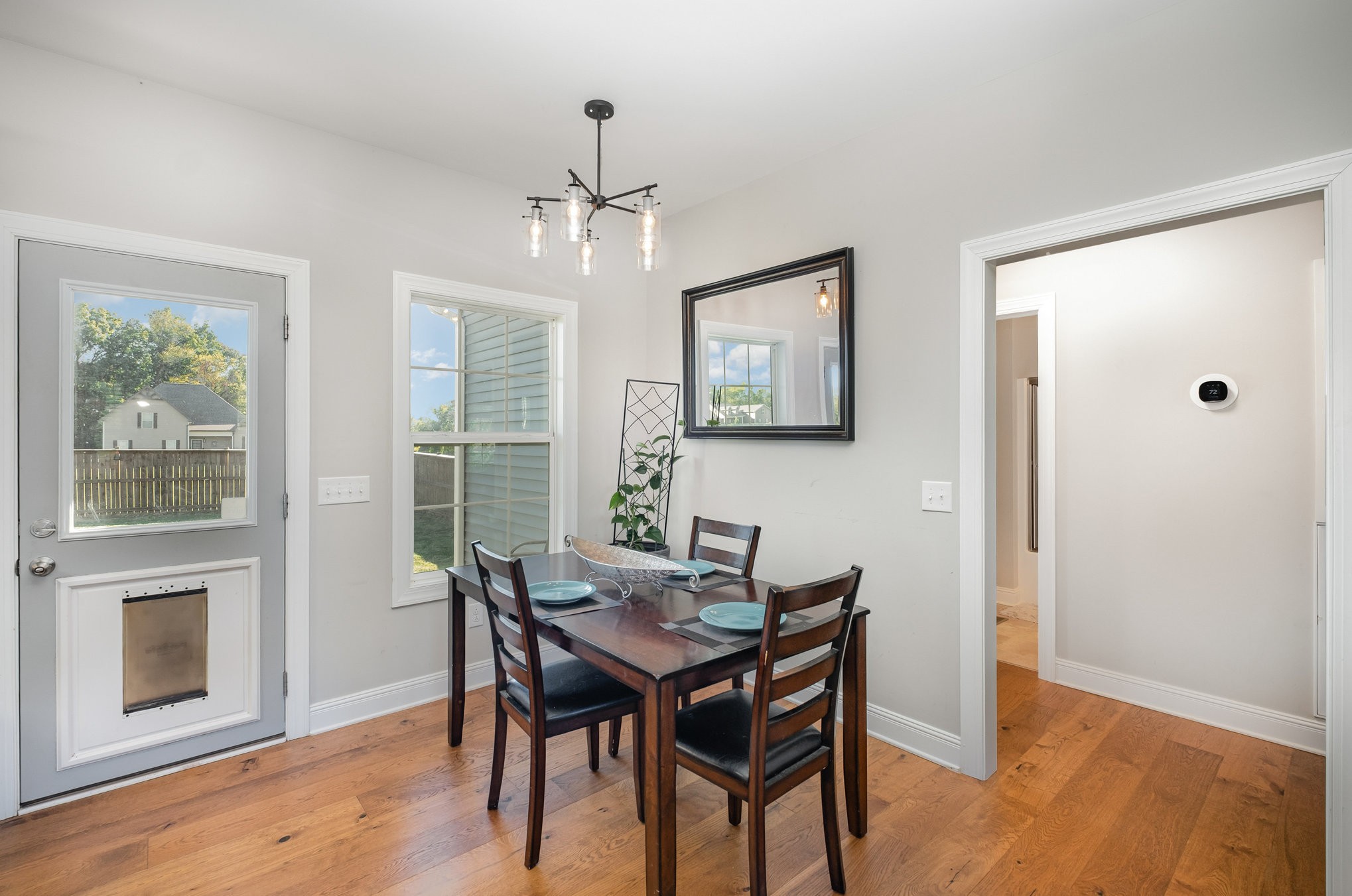 8903 Covington Road White House, TN 37188 - Photo 13 of 36 a view of a dining room with furniture window and wooden floor