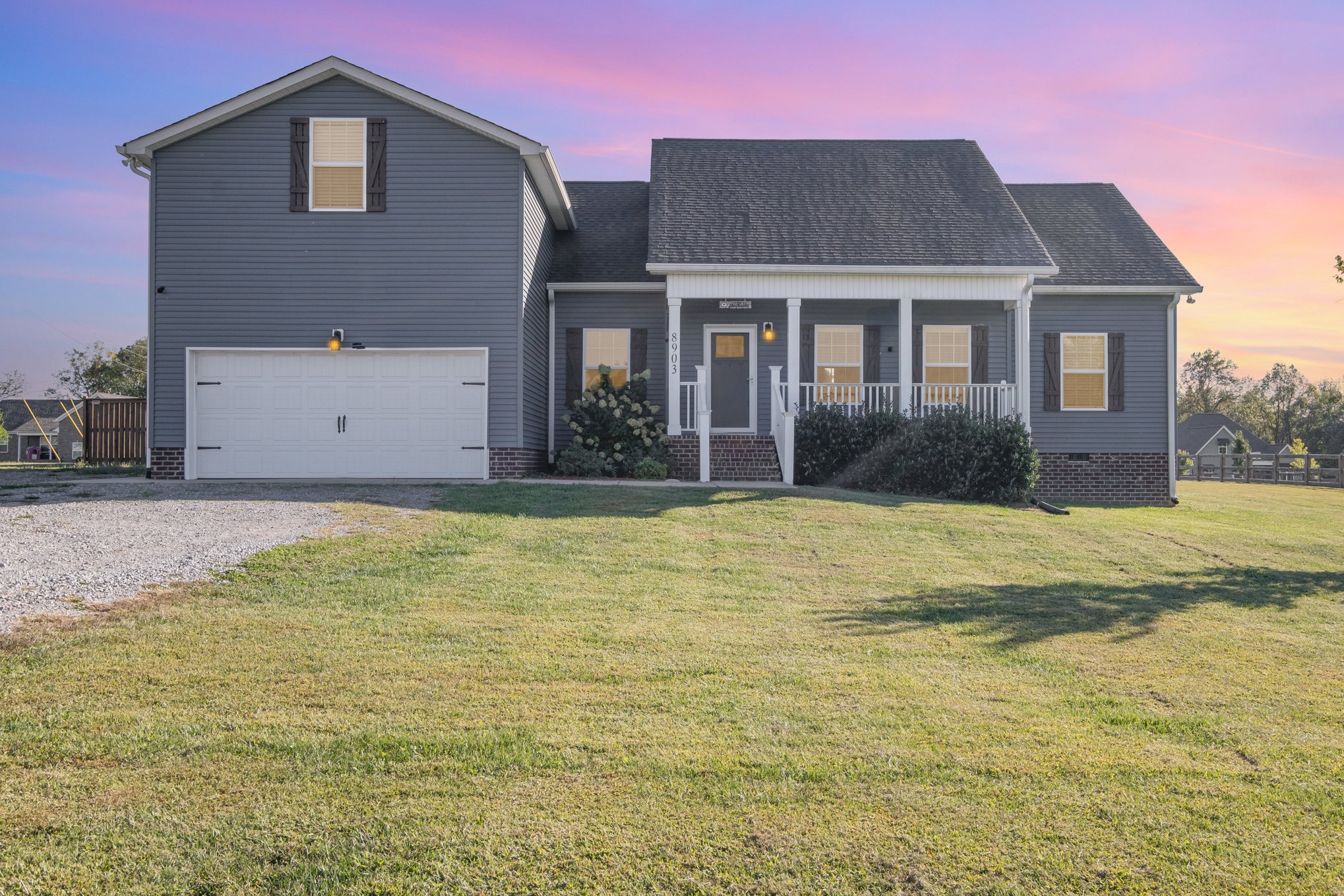 8903 Covington Road White House, TN 37188 - Photo 2 of 36 a front view of a house with a yard