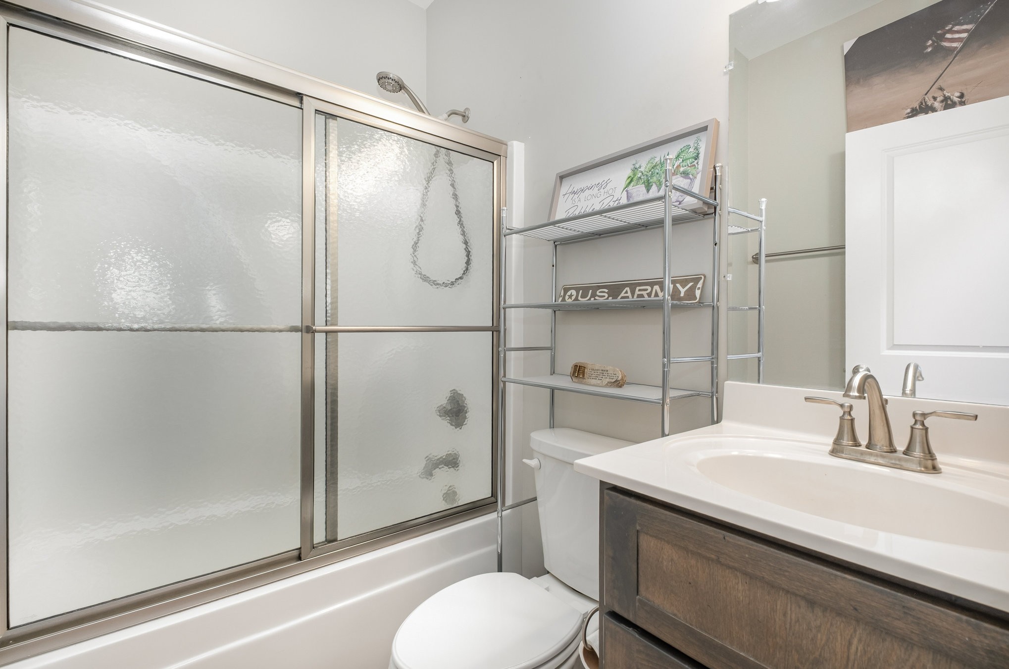 8903 Covington Road White House, TN 37188 - Photo 24 of 36 a bathroom with a sink toilet and shower