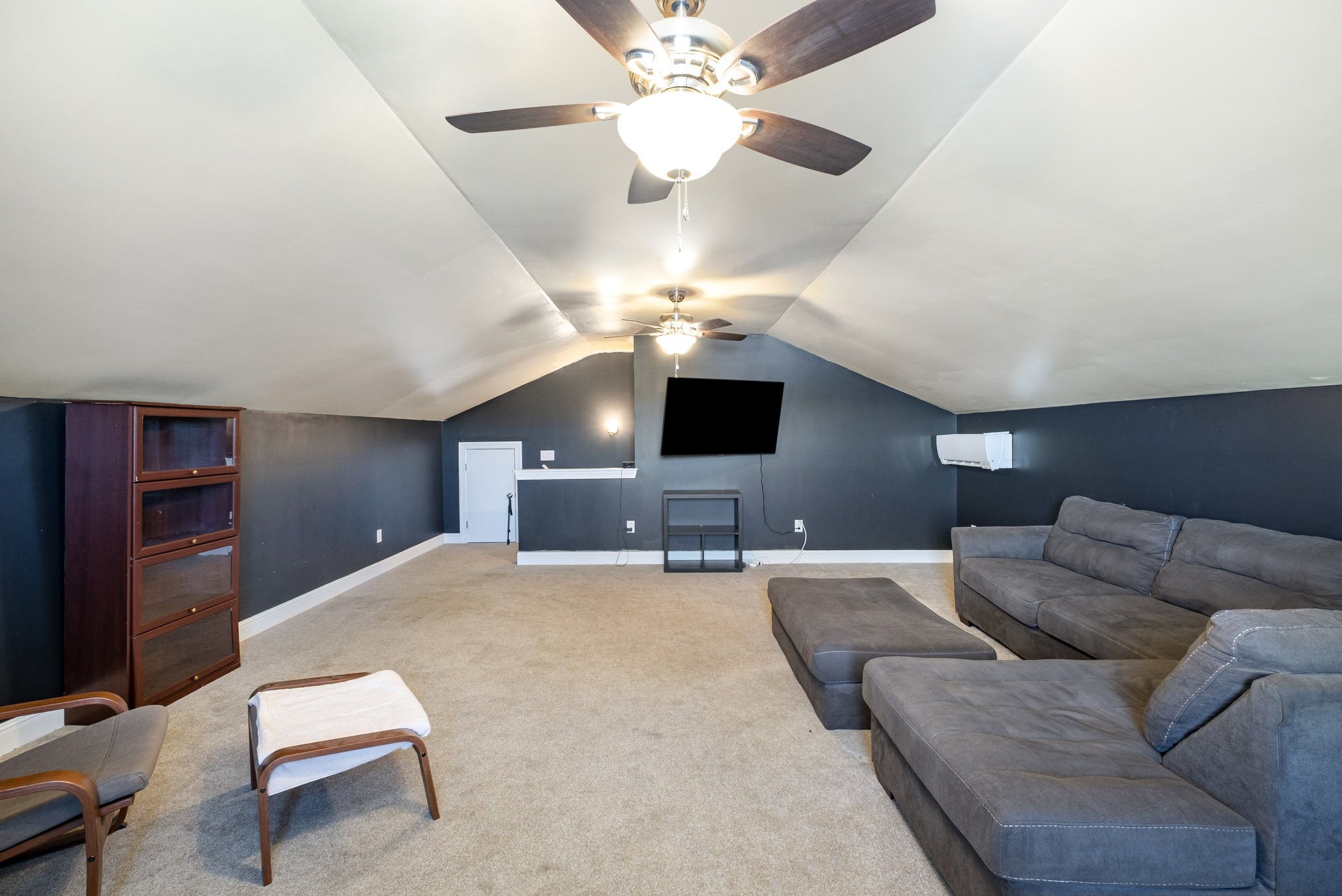 8903 Covington Road White House, TN 37188 - Photo 26 of 36 a living room with furniture and a chandelier