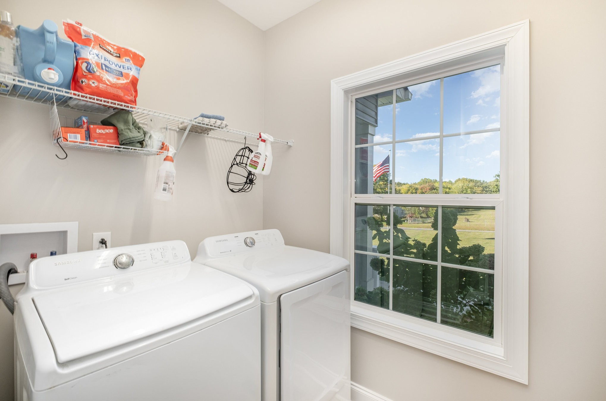 8903 Covington Road White House, TN 37188 - Photo 27 of 36 a utility room with dryer and washer