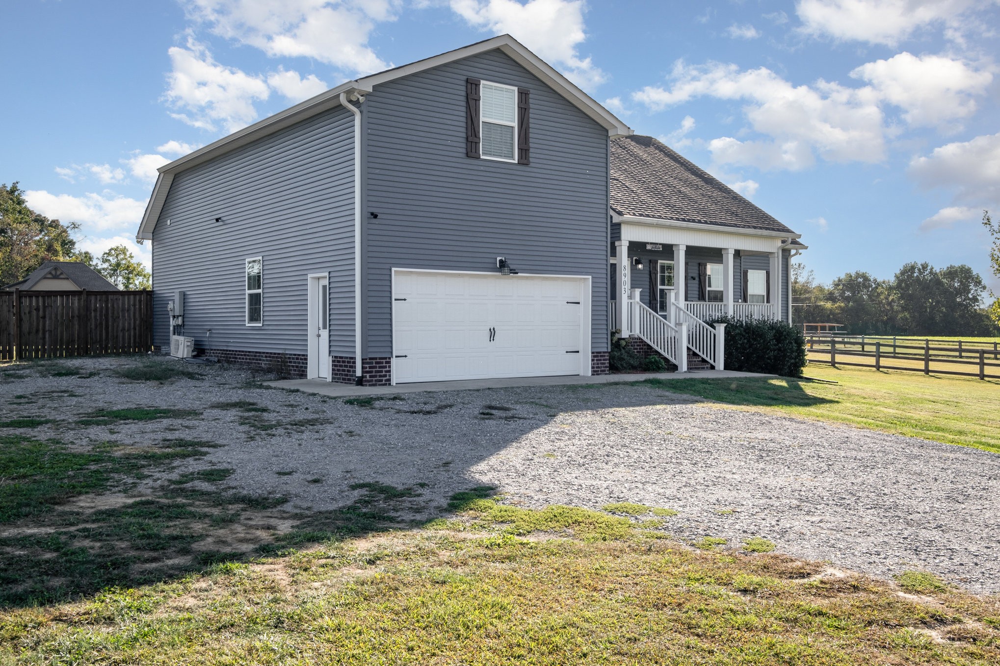 8903 Covington Road White House, TN 37188 - Photo 3 of 36 a view of a house with a backyard